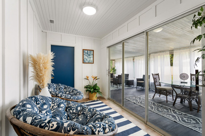 Staged coastal living room by Michelle Moss.
